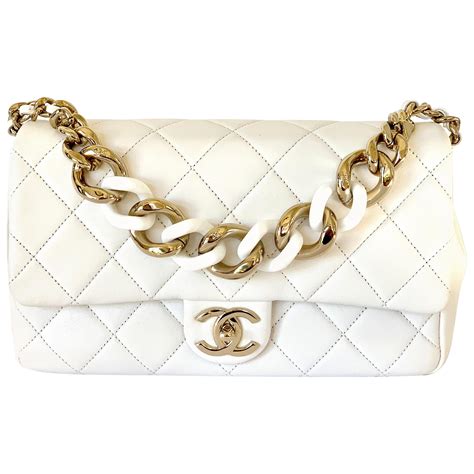 white chanel bag with gold chain|White Chanel shoulder bag.